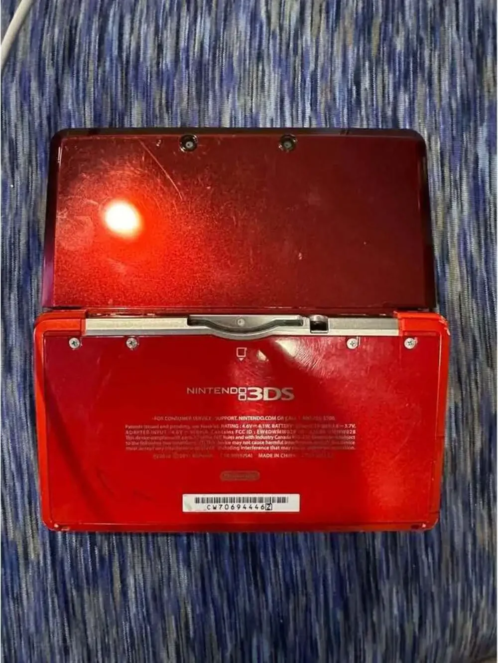 CIB pink Nintendo, DSI, and red 3DS bundle